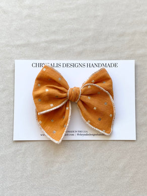 Orange fable bow